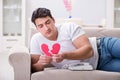 The young man in sad saint valentine concept Royalty Free Stock Photo