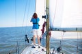 Young man sailing. Teenager boy on sea sail boat.