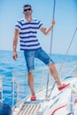 Young man sailing yacht Royalty Free Stock Photo