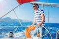 Young man sailing yacht Royalty Free Stock Photo