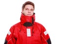 Young man sailor in red wind jacket. Sailing. Royalty Free Stock Photo