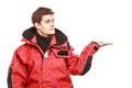 Young man sailor in red wind jacket. Sailing. Royalty Free Stock Photo