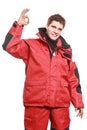 Young man sailor in red wind jacket. Sailing. Royalty Free Stock Photo