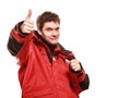 Young man sailor in red wind jacket. Sailing. Royalty Free Stock Photo