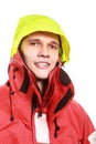 Young man sailor in red wind jacket. Sailing. Royalty Free Stock Photo