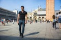 Young Man in San Marco Square in Venice, Italy Royalty Free Stock Photo