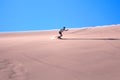 A young man on the sandboard Royalty Free Stock Photo