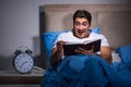 The young man scared in bed Royalty Free Stock Photo