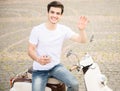 Young man on scooter Royalty Free Stock Photo