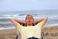 Young man on sea beach Royalty Free Stock Photo