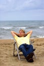 Young man on sea beach Royalty Free Stock Photo