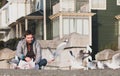 Young man and seagulls