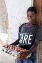 Young man selling boiled eggs