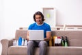 Young man selling cosmetics via internet