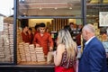 Young man selling the infamous Turkish coffee at Kurukahveci Mehmet Efendi
