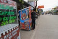 a young man selling various types of firecrackers to celebrate festive days