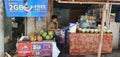 Young Man Sells Coconut Fruits at Roadside in the Philippines, Asia