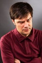 Young man with serious expression Royalty Free Stock Photo