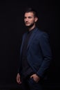 Young man looking sideways suit jacket elegant Royalty Free Stock Photo