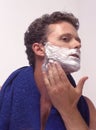 A young man shaving Royalty Free Stock Photo