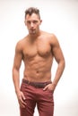 Young man shirtless pants body muscular model Royalty Free Stock Photo