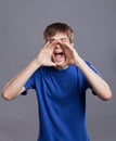 Young man shouting attaching