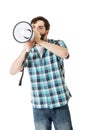 Young man shouting through megaphone. Royalty Free Stock Photo