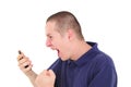 Young man shouting on the phone Royalty Free Stock Photo