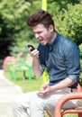 Young man shouting on telephone