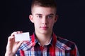 Young man showing blank business card Royalty Free Stock Photo