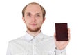 Young man in showing his id document isolated