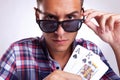 A young man showing his poker pair Royalty Free Stock Photo