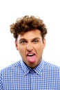 Young man showing his tongue Royalty Free Stock Photo