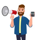 Young man showing or holding megaphone loudspeaker and digital calculator device and magnifying glass in hand. Marketing. Royalty Free Stock Photo