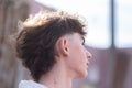 Young man showing a mullet hairstyle. Royalty Free Stock Photo