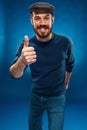 The young man showing the ok thumbs up hand sign Royalty Free Stock Photo