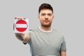 Young man showing stop sign Royalty Free Stock Photo