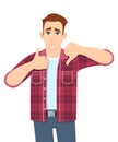 Young man showing thumbs up and down. Trendy person making like and dislike gesture sign. Male character doing good and bad symbol Royalty Free Stock Photo
