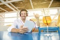 Young man showing thumbs up working as freelance in outdoor Royalty Free Stock Photo