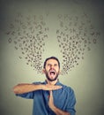 Young man showing time out hand gesture, frustrated screaming to stop Royalty Free Stock Photo