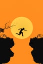 Young man in silhouette jumps between two cliffs on big moon ba