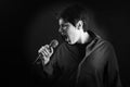 Young man singer with microphone expression Royalty Free Stock Photo
