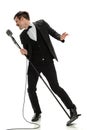 Young Man Singing inot Vintage Microphone Royalty Free Stock Photo