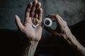 Man taking pills from the container Royalty Free Stock Photo