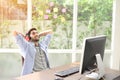 A young man eyes closed, listening to music using headphones Royalty Free Stock Photo