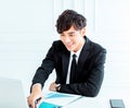 Young man sitting at his desk in the office Royalty Free Stock Photo