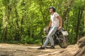 Young man sitting on his motorbike