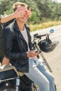 Young man sitting on his motorbike Royalty Free Stock Photo