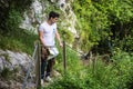 Young man sitting in nature park Royalty Free Stock Photo