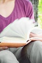 Young man is sitting and reading a book Royalty Free Stock Photo